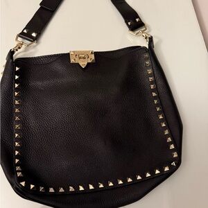 Valentino Rockstud crossbody bag. Black leather with gold studs. preowned.